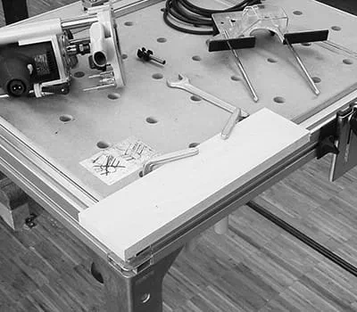 Securing the workpiece on the multifunction table