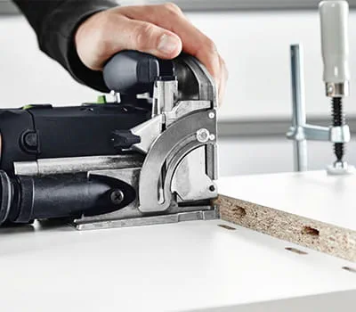 Routing dowel holes into the centre shelf