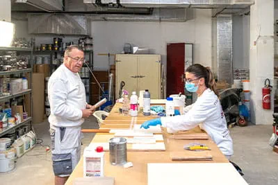In the Didier painting company workshop